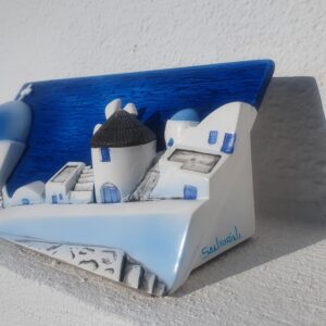 Santorini miniature with white buildings and blue domes