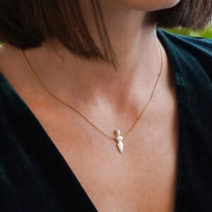 Gold necklace with small goddess pendant