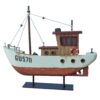 Rustic decorative fishing boat model on stand