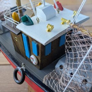 Close-up of detailed model fishing boat deck