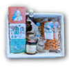 Greek-themed gift basket with snacks and liqueur
