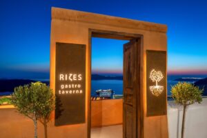 Open doorway overlooking sea at dusk in Santorini