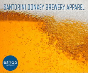 Close-up of golden beer with brewery text overlay