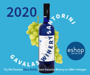 Blue Santorini wine bottle with green grapes