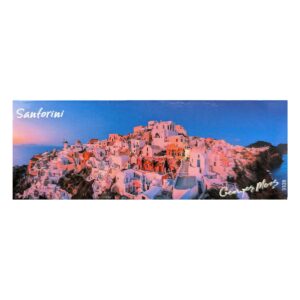Santorini cliffside village at sunset over Aegean Sea