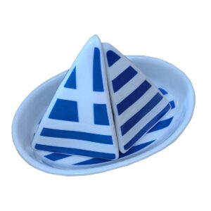 Blue patterned folded napkins on white plate