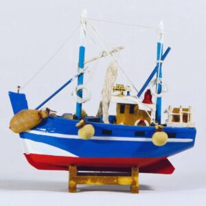 Colorful miniature fishing boat model on stand