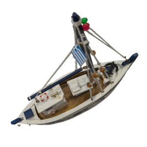 Handcrafted miniature white and blue sailboat model