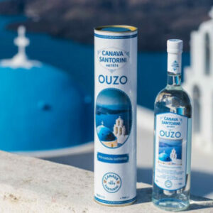 Canava Santorini Ouzo bottle with Santorini backdrop