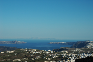 Santorini caldera with white buildings and blue sea