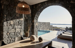 Stone villa patio with pool and sea view