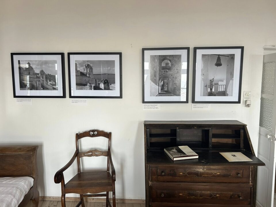 Vintage room with framed photos and wooden furniture