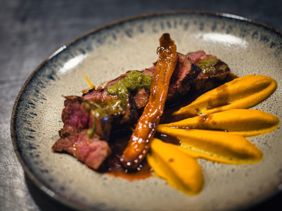 Gourmet steak with carrot puree and sauce