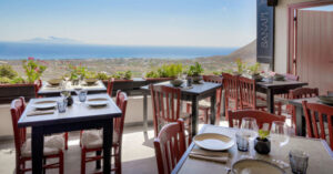 Seaside restaurant terrace overlooking ocean and countryside