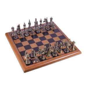 Medieval-themed metal chess set on wooden board